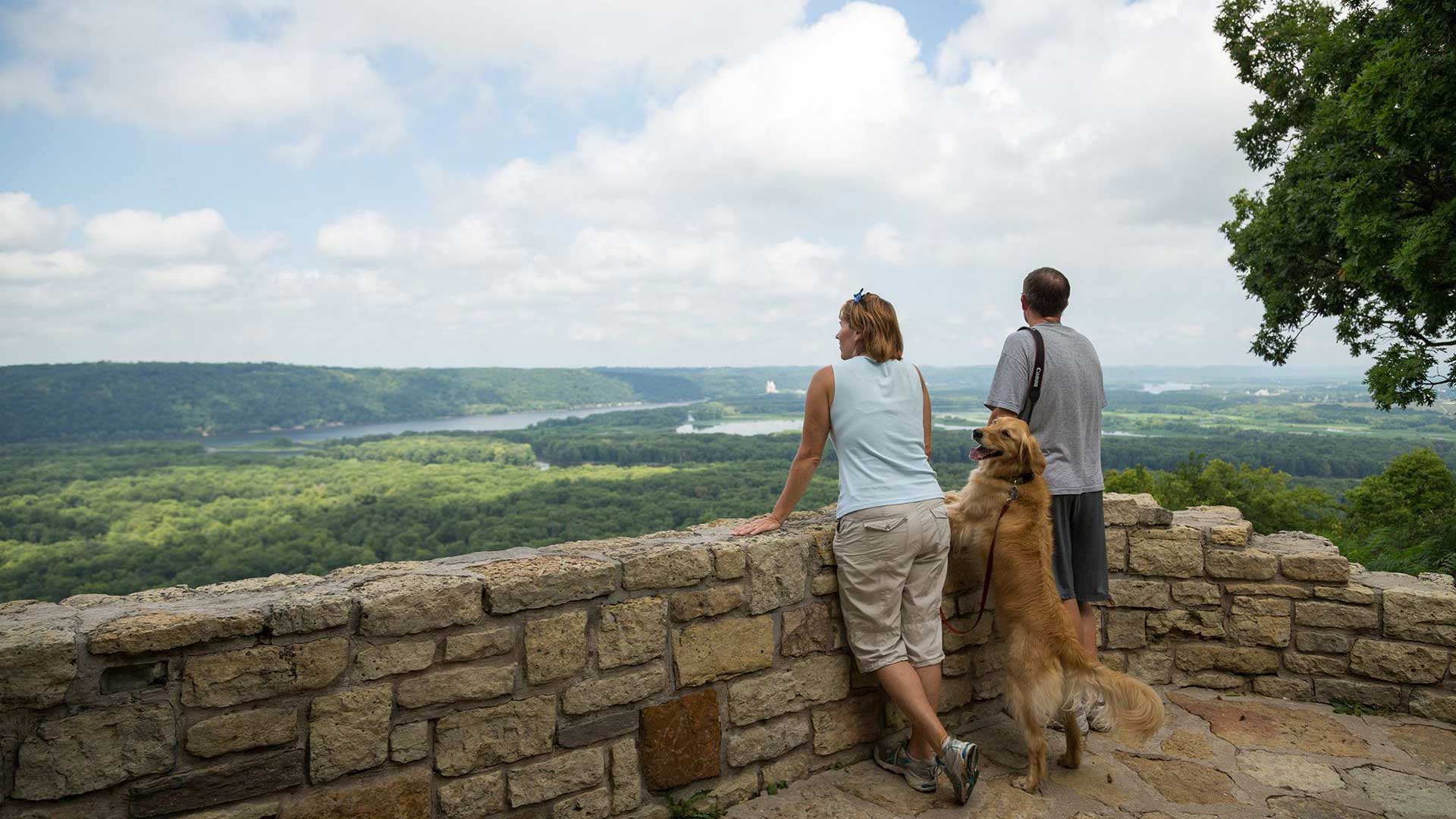 Couple and dog at scenic overlook at Wyalusing State Park along the Wisconsin Great River Road